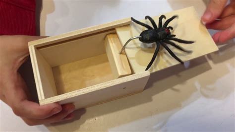 wooden box with metal spider|spider box prank ideas.